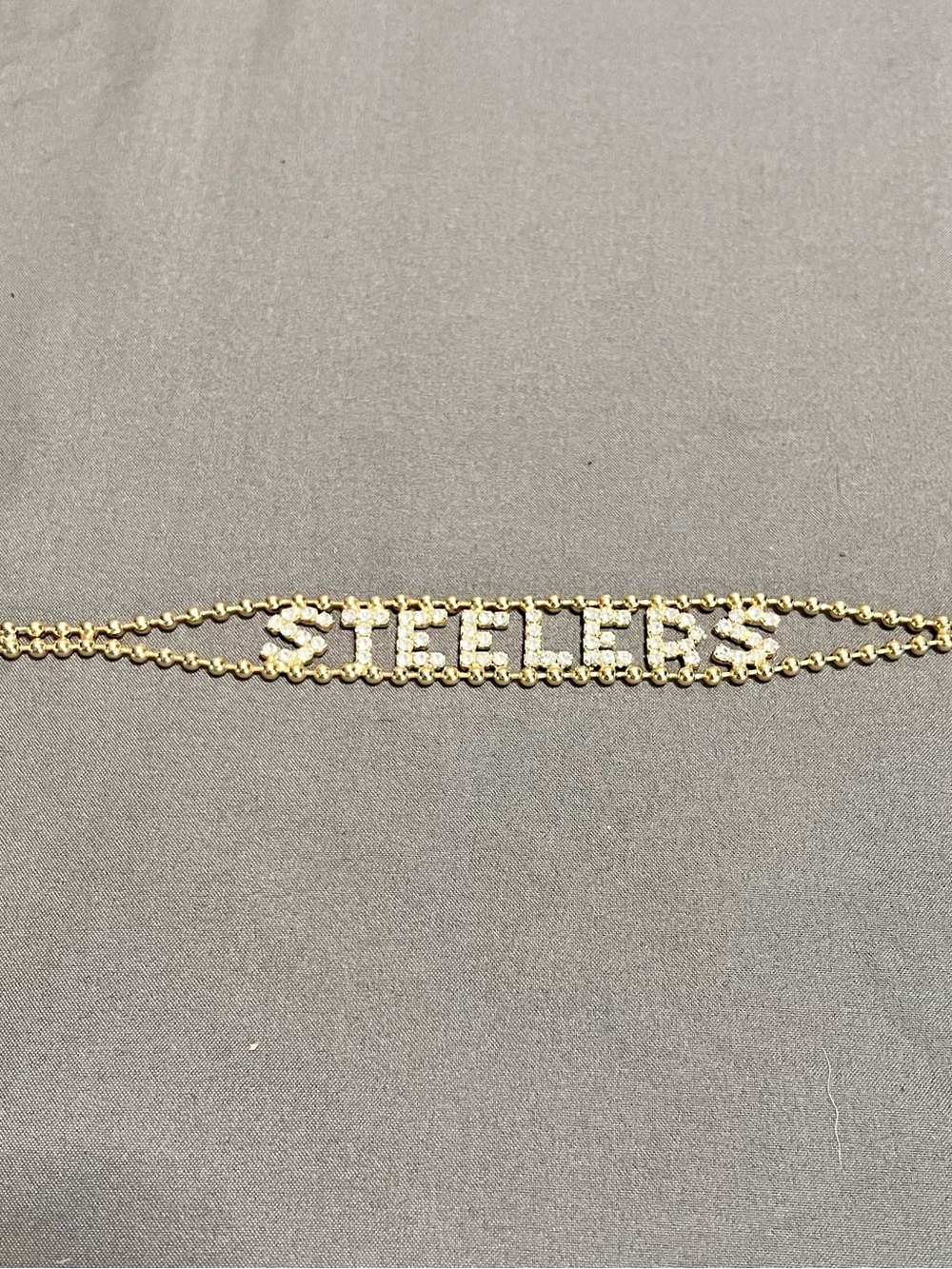Pittsburgh Steelers Women’s Rhinestone & Gold Tone Metal Bracelet 7.75” NFL